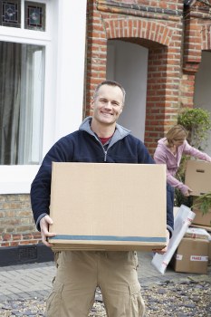 Office relocation planning in Westminster with moving boxes and workspace setup