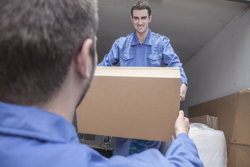 Removal team planning a house move in Westminster street