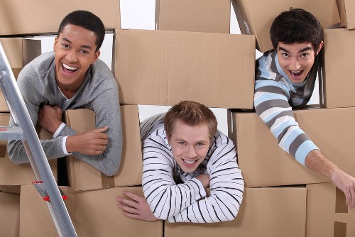 Furniture and boxes being loaded for a Westminster man and van move