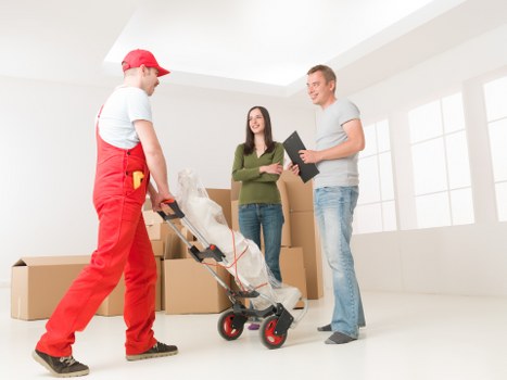 Loading furniture into a van for a Westminster move