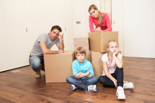Prepared boxes and furniture ready for man with van collection