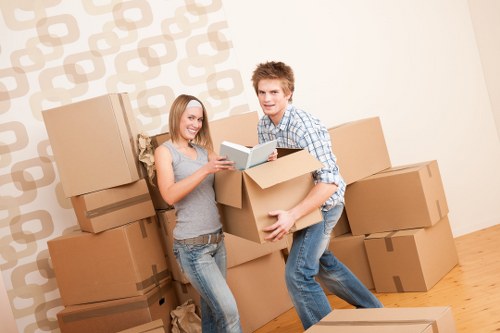Loading boxes into a removal truck in Westminster