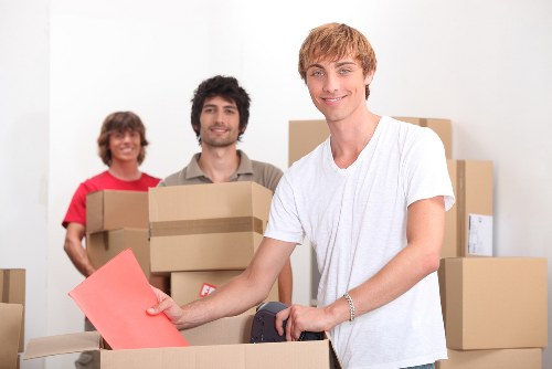 Office relocation packing services in Westminster with labeled boxes and equipment